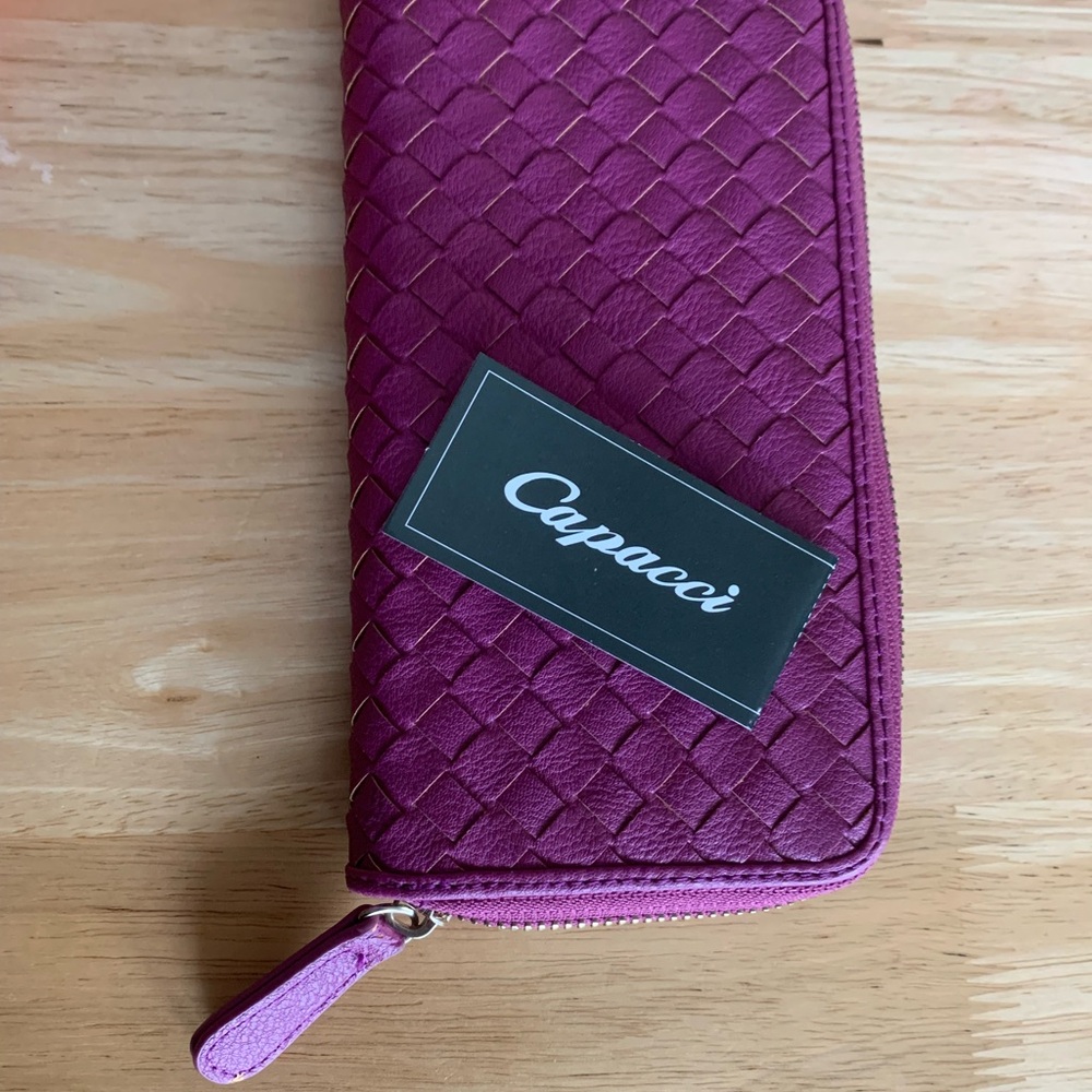 Harman Purple Wallet with Textured Surface and Zipper Closure